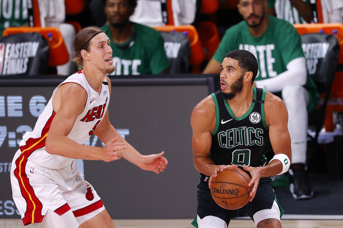 Jayson Tatum of the Boston Celtics drives the ball against Kelly Olynyk of the Miami Heat during the second quarter in Game Five of the Eastern Conference Finals during the 2020 NBA Playoffs at AdventHealth Arena at the ESPN Wide World Of Sports Complex on September 25, 2020 in Lake Buena Vista, Florida.&nbsp;