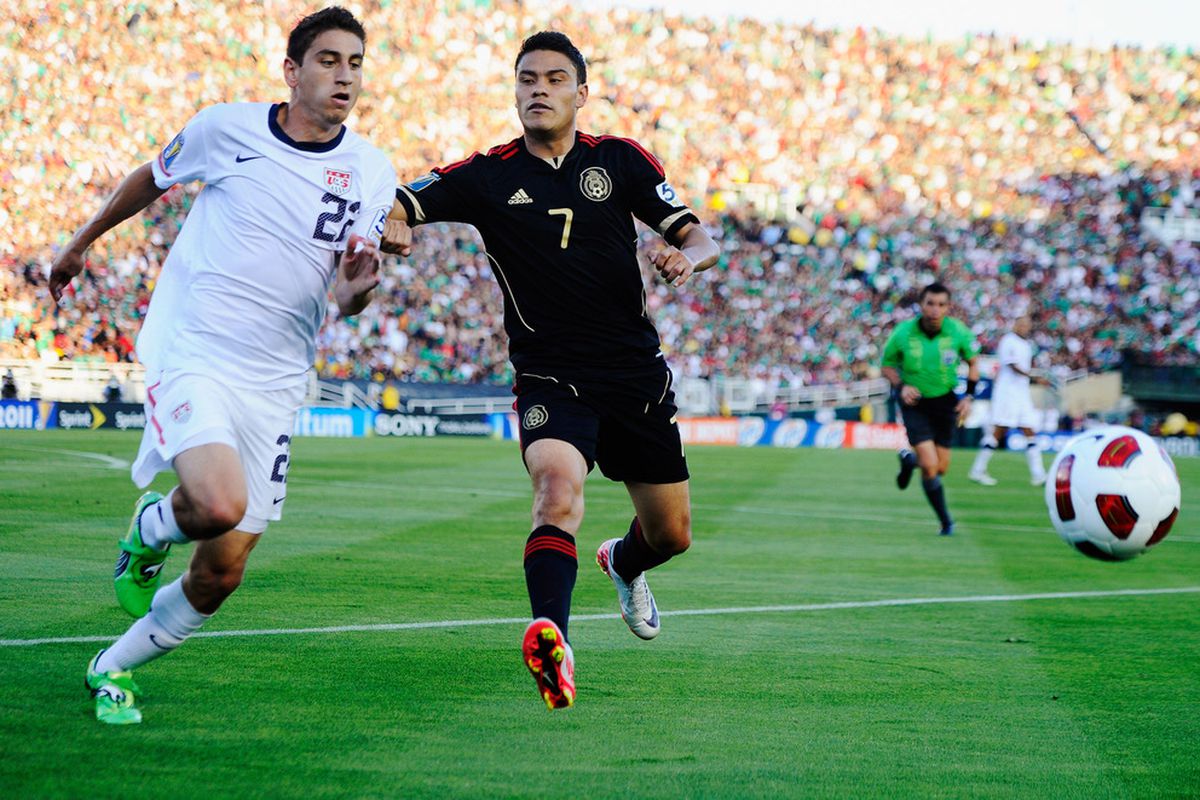 Pablo Barrera #7 of Mexico defends against Alejandro Bedoya #22 of the United States during the 2011 CONCACAF Gold Cup Championship at the Rose Bowl on June 25, 2011 in Pasadena, California.  (Photo by Kevork Djansezian/Getty Images)