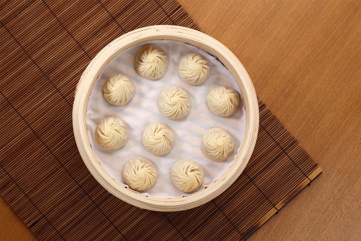 A basket of soup dumplings