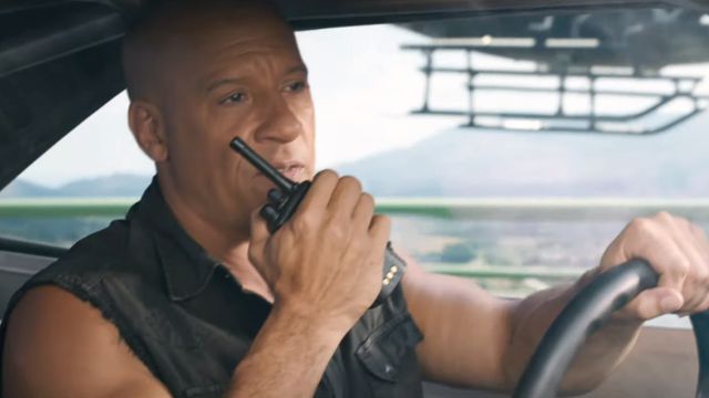 Dom Toretto, behind the wheel of a very fast car, calls in on a walkie-talkie in one of the Fast &amp; Furious movies