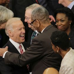 Vice President Joe Biden is greeted by Rep. Bobby Rush, D-Ill., on Capitol Hill in Washington, Tuesday, Jan. 12, 2106, before President Barack Obama’s State of the Union address before a joint session of Congress.