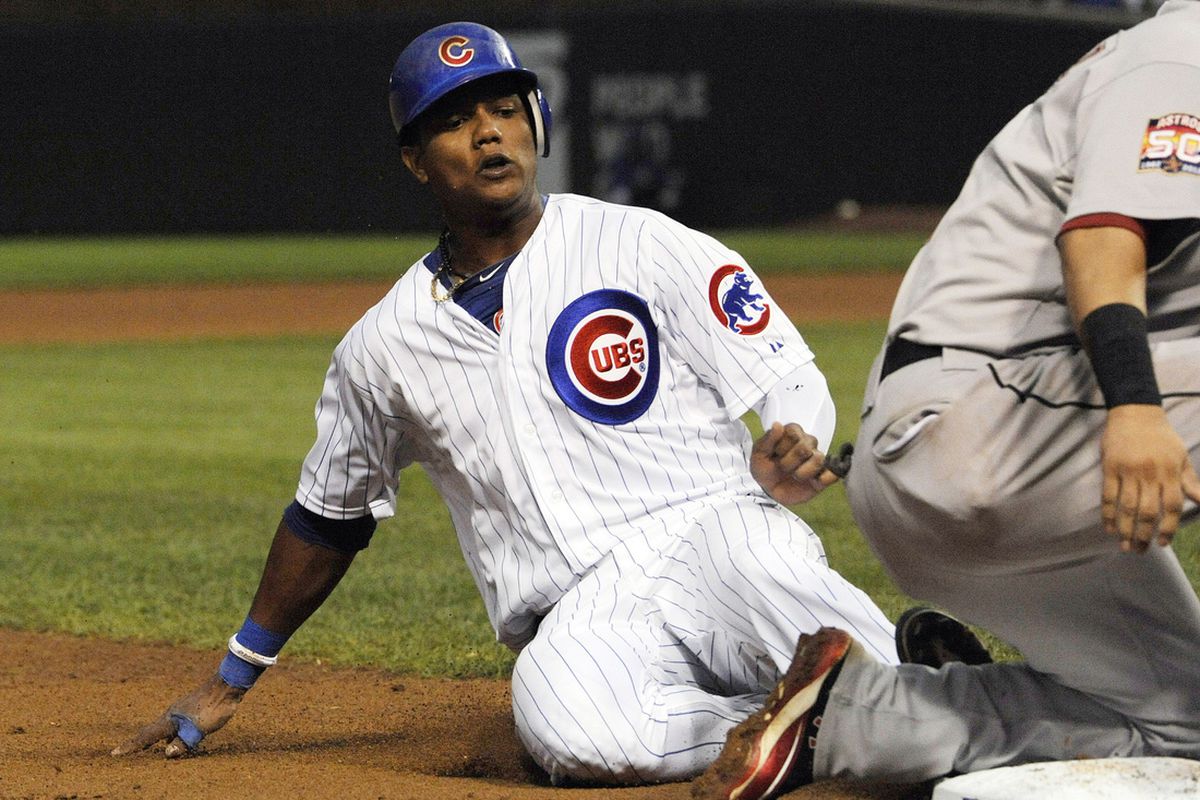 Starlin Castro of the Chicago Cubs steals third base against the Houston Astros at Wrigley Field in Chicago, Illinois. (Photo by David Banks/Getty Images) 