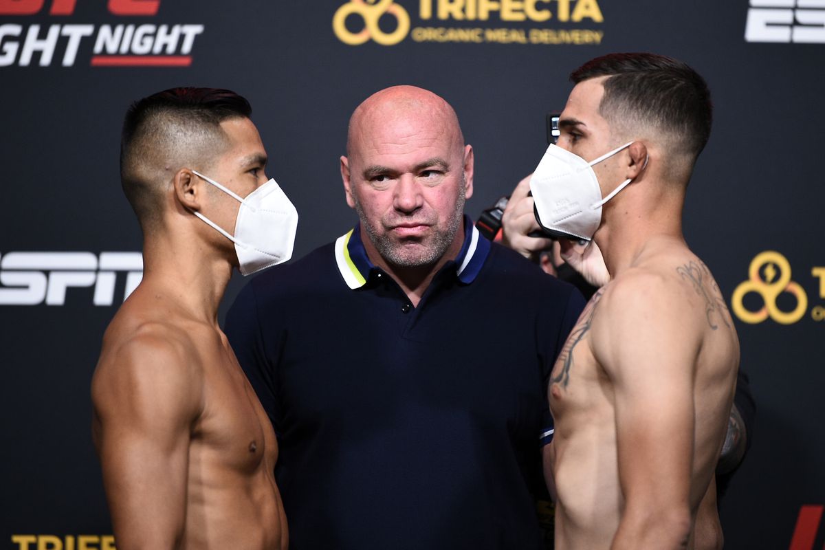 Opponents Tyson Nam and Jerome Rivera face off during the UFC Fight Night weigh-in at UFC APEX on September 18, 2020 in Las Vegas, Nevada.