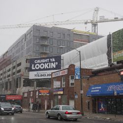 The Addison and Clark Project, viewed from Clark and Addison, as the snow begins to fall