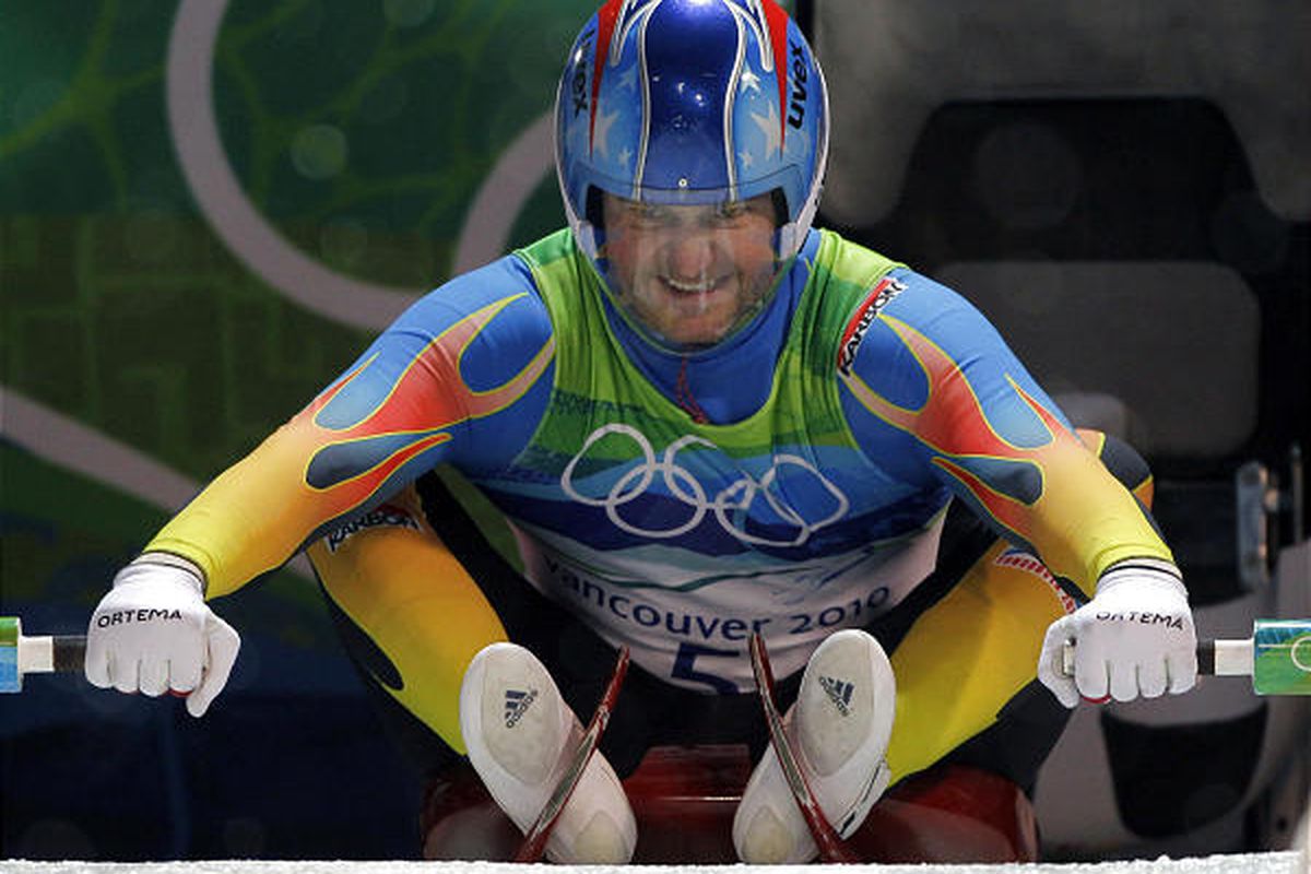 Tony Benshoof of the United States starts the first run of the men's singles luge competition in Whistler Saturday.