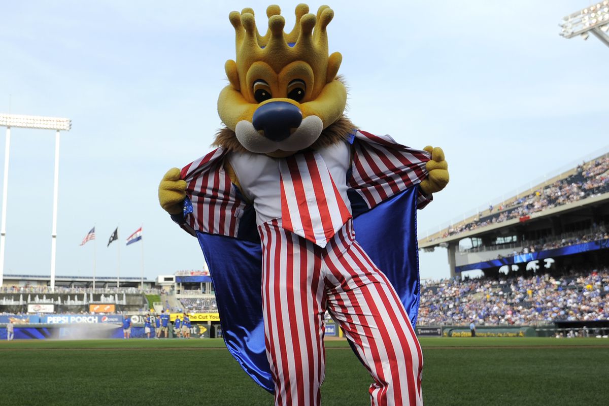 Uncle Sam-ish, with a blue velvet cape, a crown, and a flasher pose.