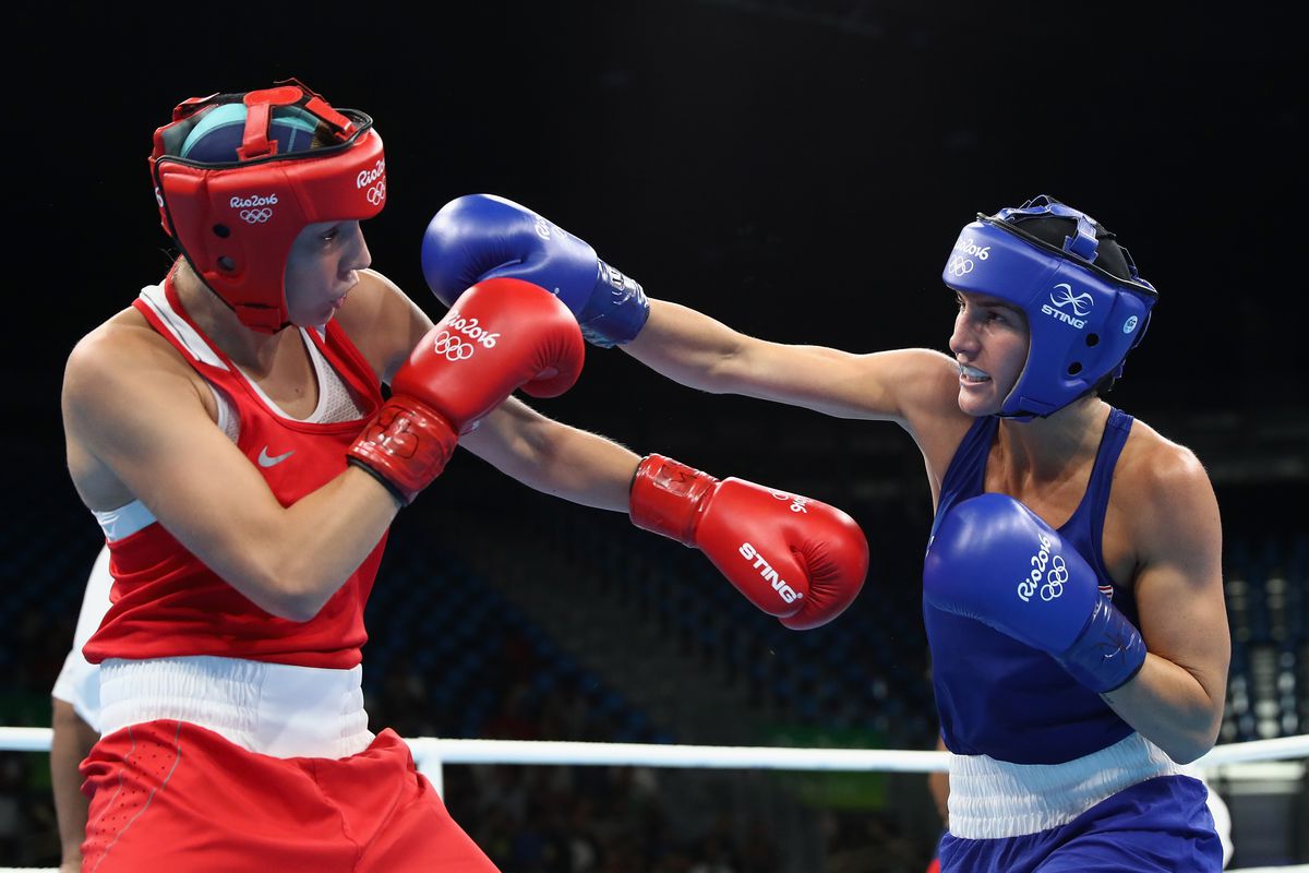 Anastasiia Beliakova of Russia fights Mikaela Joslin Mayer of USA in the womens lightweight 57-60kg during the Boxing at Riocentro on August 15, 2016 in Rio de Janeiro, Brazil.