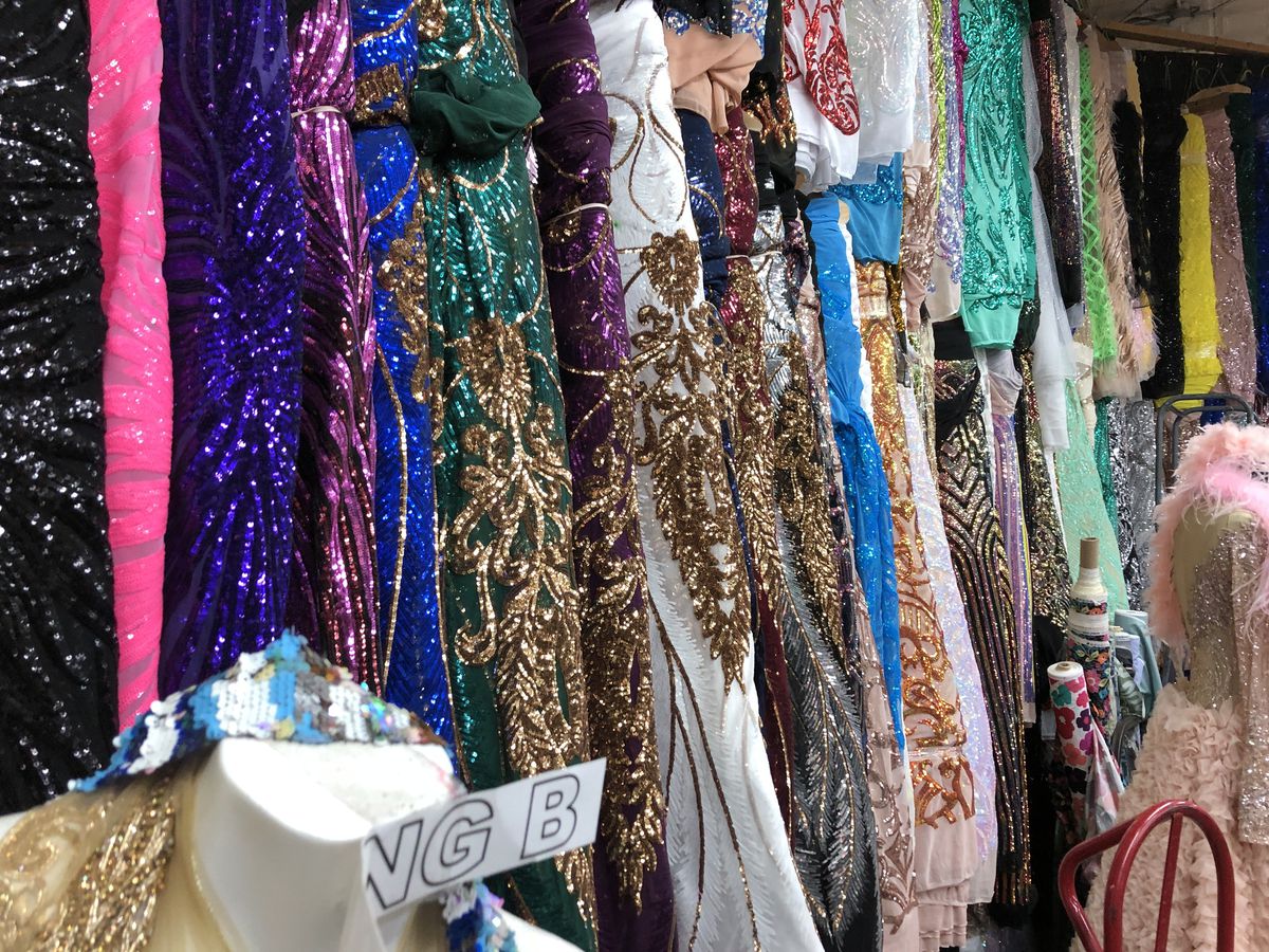 There’s more than just bolts of cloth at Textile Discount Outlet in Pilsen. There are spools of ribbon and thread, buttons and glittery fringe.