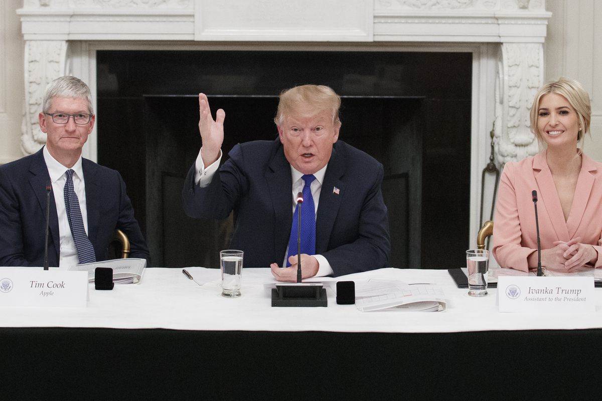 U.S. President Donald Trump delivers remarks as Apple CEO Tim Cook and Ivanka Trump look on during a meeting with the American Workforce Policy Advisory Board inside the State Dining Room on March 6, 2019 in Washington, DC.