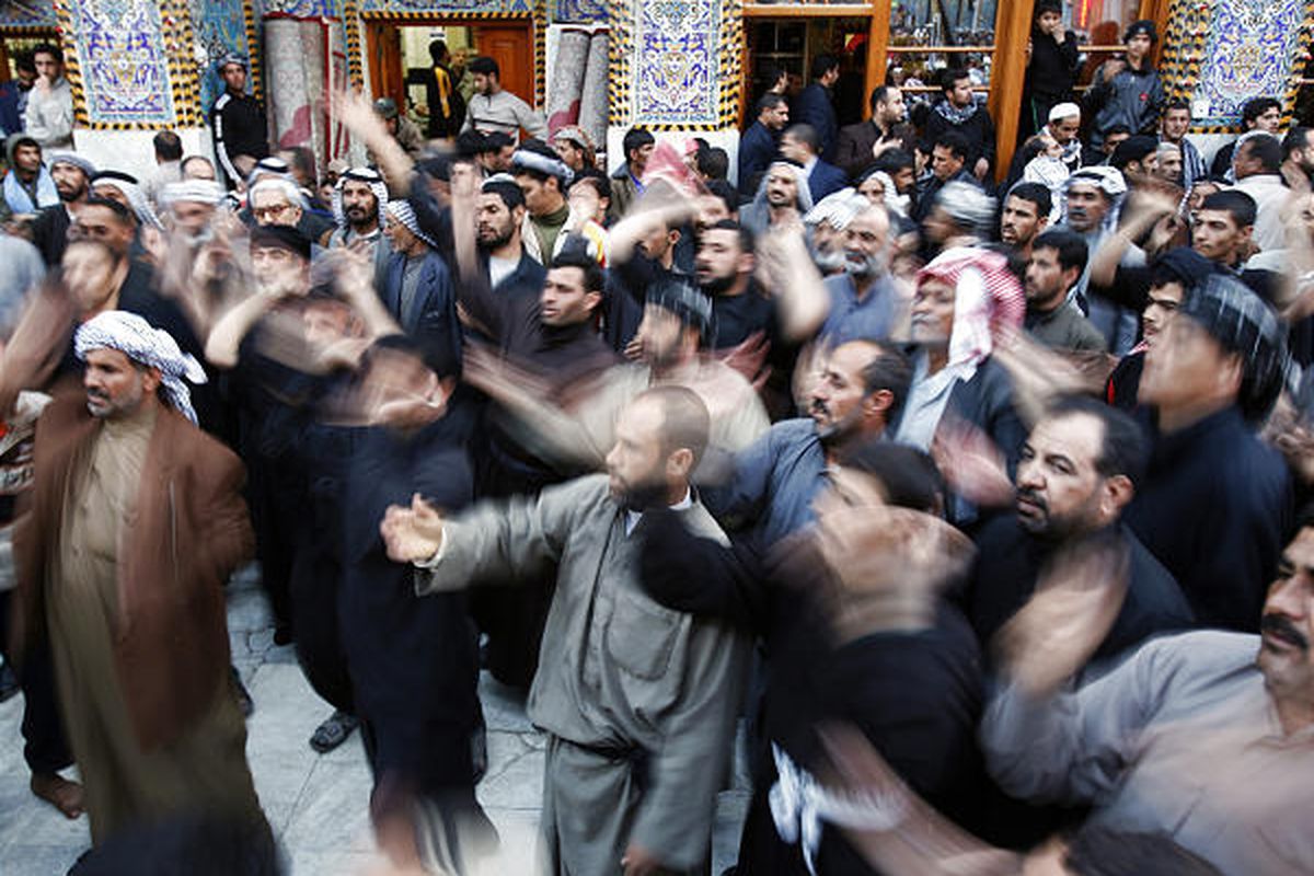 Shiite pilgrims beat themselves during the festival of Arbaeen, one of the holiest days in their religious calendar in the holy city of Karbala, Iraq, Feb. 4, 2010.