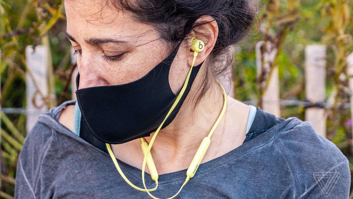 Apple’s new Beats Flex earbuds, pictured in yellow.