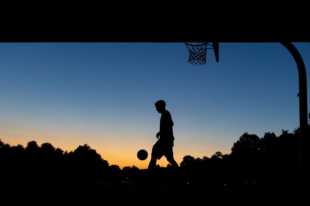 Basketball in the twilight