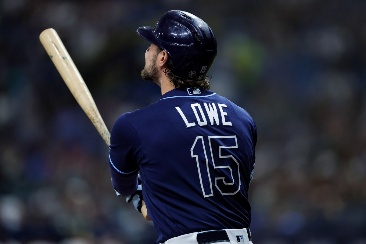 Josh Lowe of the Tampa Bay Rays connects for an RBI double in the third inning against the New York Yankees at Tropicana Field on August 26, 2023 in St Petersburg, Florida.