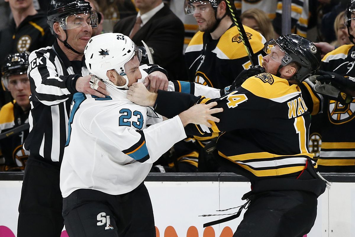 Feb 26, 2019; Boston, MA, USA; San Jose Sharks right wing Barclay Goodrow (23) fights with Boston Bruins right wing Chris Wagner (14) during the second period at TD Garden.