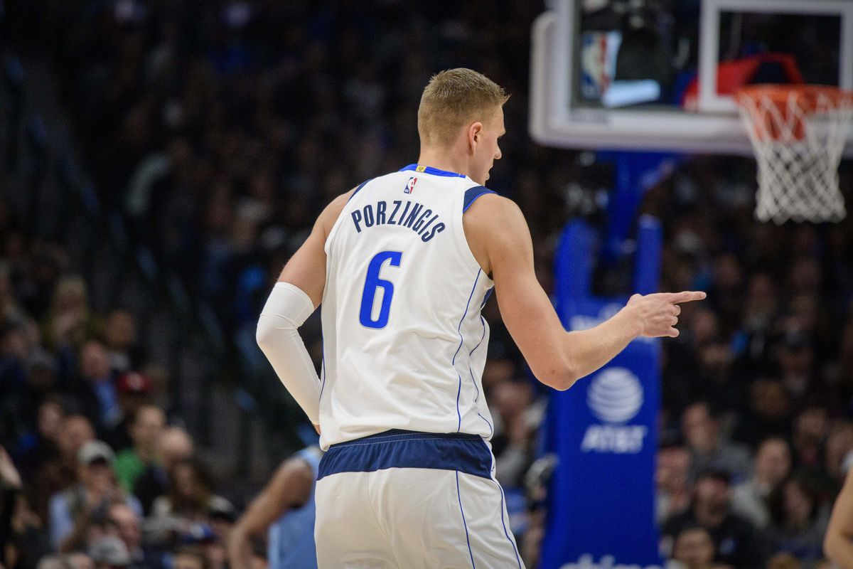 Dallas Mavericks forward Kristaps Porzingis celebrates making a three point shot against the Memphis Grizzlies during the first quarter at the American Airlines Center.