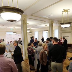 Attendees gather as the Kem C. Gardner Policy Institute at the University of Utah hosts a Newsmaker Breakfast at the Thomas S. Monson Center in Salt Lake City on Thursday, Sept. 22, 2016.