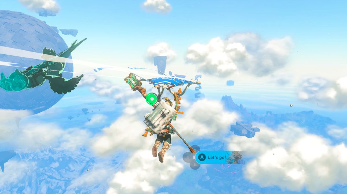 Link paraglides by a sphere in the Gerudo Highlands Sky region in Zelda: Tears of the Kingdom