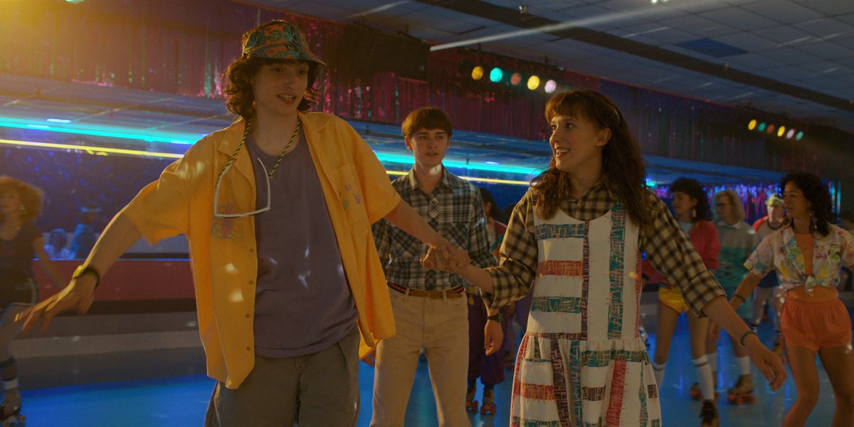 mike and eleven at a roller rink