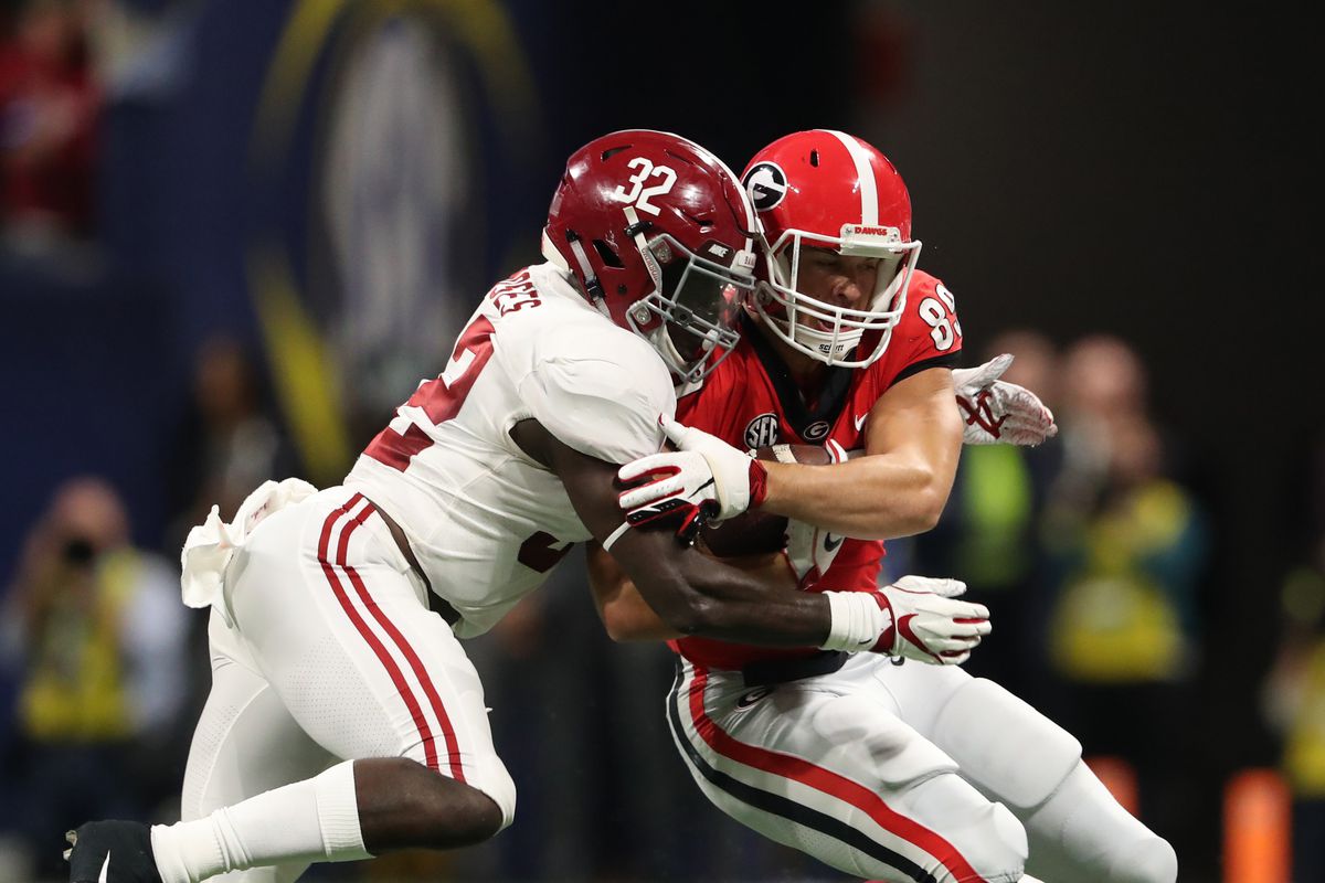 Alabama LB Dylan Moses tackles Georgia TE Charlie Woerner in the SEC Championship, Dec. 1, 2018.