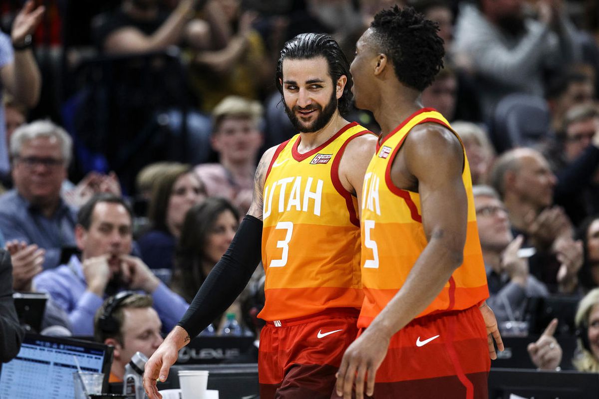 Utah Jazz guard Ricky Rubio (3) and guard Donovan Mitchell (45) head to the bench in the final moments of the Jazz's 129-99 win over the Golden State Warriors at Vivint Smart Home Arena in Salt Lake City on Tuesday, Jan. 30, 2018.
