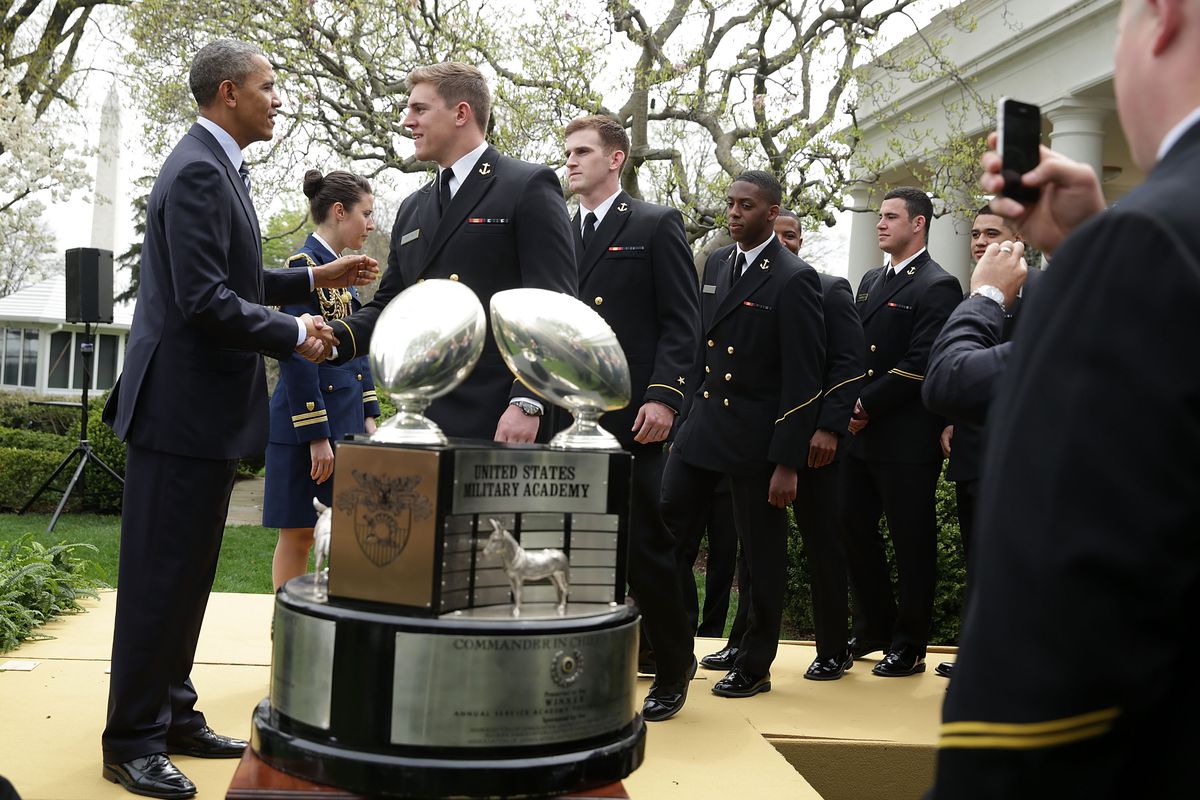 President Obama Presents The Commander-In-Chief Trophy To Naval Academy Football Team