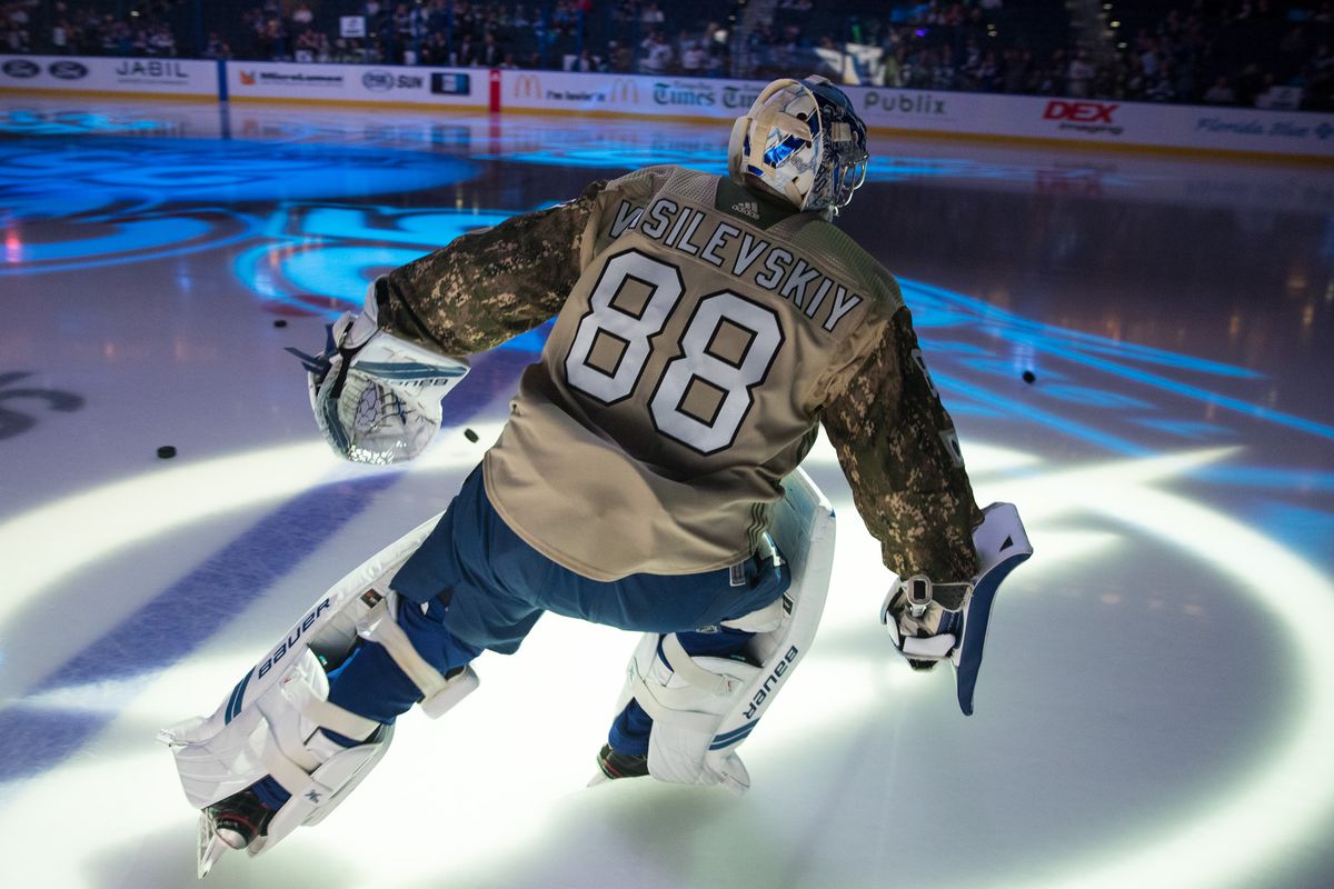 TAMPA, FL - NOVEMBER 16: Goalie Andrei Vasilevskiy #88 of the Tampa Bay Lightning wears a Military Appreciation Night jersey for pregame warm ups against the Dallas Stars at Amalie Arena on November 16, 2017 in Tampa, Florida.  (Photo by Scott Audette/NHLI via Getty Images)