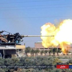 This undated image posted online on Thursday, Aug 24, 2017, by supporters of the Islamic State militant group on an anonymous photo sharing website, purports to show a gun-mounted vehicle operated by the group firing at Syrian troop in south eastern Raqqa, Syria. A Syria monitoring group says Islamic State militants have successfully pushed back government forces advancing on one of the last towns still in IS hands in the province of Raqqa. The Arabic caption reads: "Parts of the clashes with the Nusayri army (Nusayri is a derogative term for Alawites) in south eastern Raqqa." (militant photo via AP)