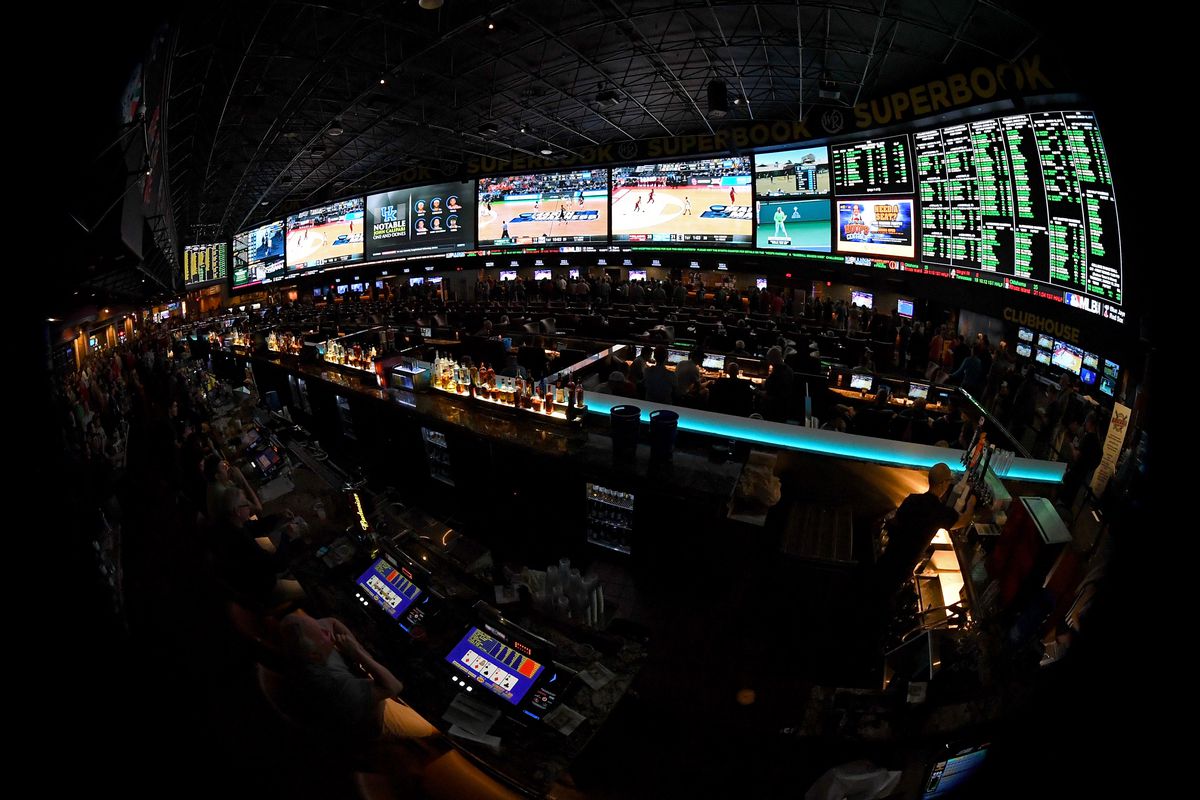 Guests attend a viewing party for the NCAA Men’s College Basketball Tournament inside the 25,000-square-foot Race &amp; Sports SuperBook at the Westgate Las Vegas Resort &amp; Casino in Las Vegas, Nevada.