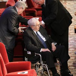 President Boyd K. Packer is assisted prior to the funeral service of Elder L. Tom Perry, at the Tabernacle in Salt Lake City, June 5, 2015.