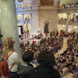 Traditional marriage supporters gather Tuesday, March 26, 2013, at the tate Capitol in Salt Lake City. Hundreds of backers of same-sex marriage also turned out to voice their views.