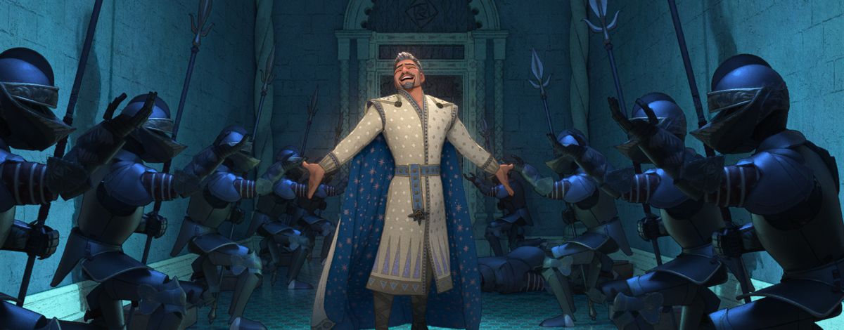 King Magnifico (Chris Pine), the royal villain in Disney’s animated movie Wish, belts his heart out on his villain song “This Is the Thanks I Get” with his eye closed, head thrown back, and arms held out to the sides, as an honor guard of black suits of armor holding pikes kneels on both sides of him, raising their palms in respect