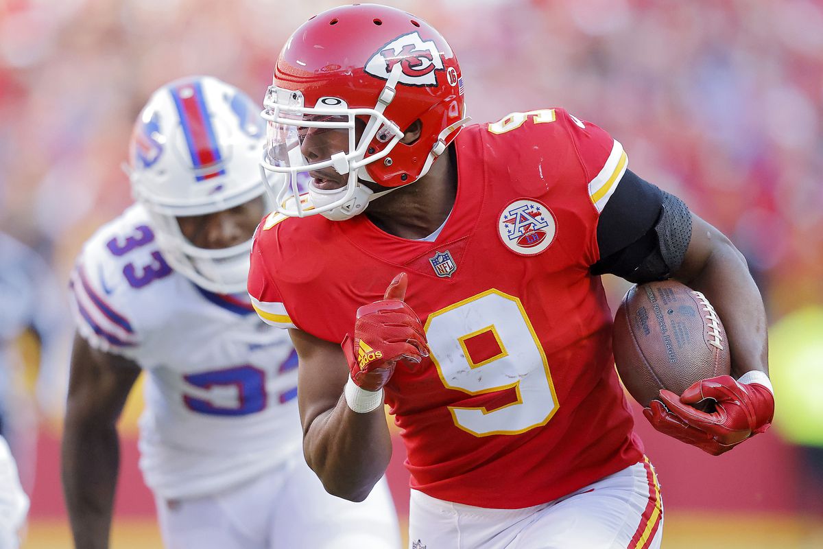 JuJu Smith-Schuster #9 of the Kansas City Chiefs runs the ball after a catch for a touchdown during the second quarter against the Buffalo Bills at Arrowhead Stadium on October 16, 2022 in Kansas City, Missouri.