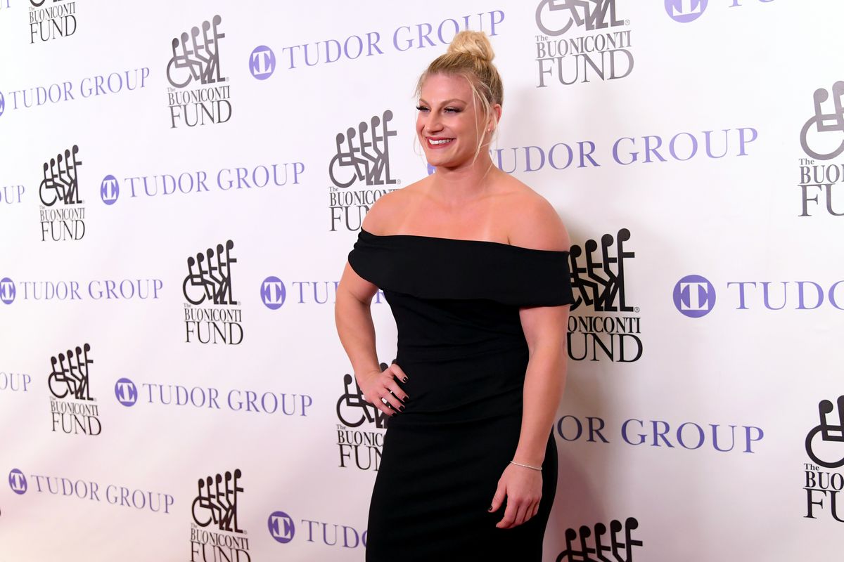 Kayla Harrison walks the red carpet at the 33rd Annual Great Sports Legends Dinner in 2018.