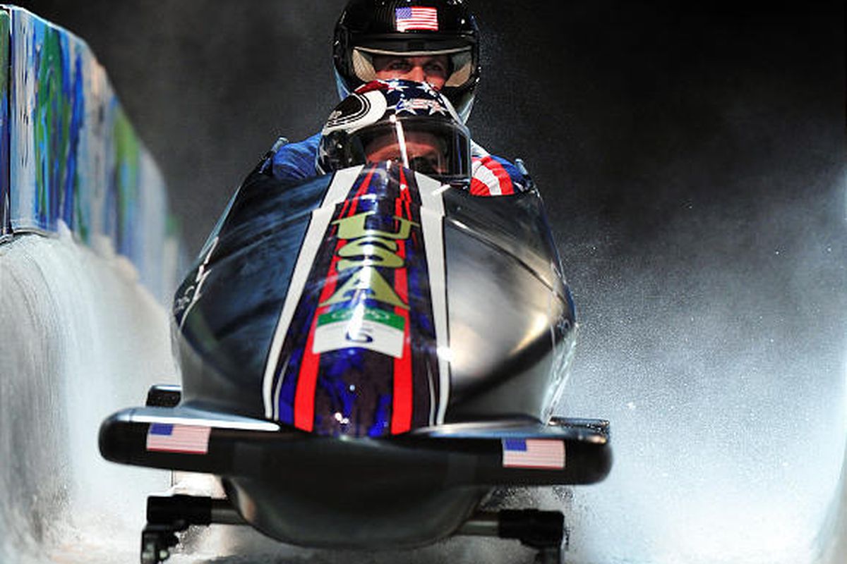 Park City's Steven Holcomb and Curtis Tomasevicz of the U.S. are less than a second from winning a bobsledding medal.  