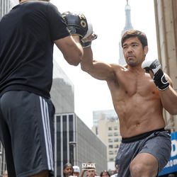 Lyoto Machida hits pads with brother Chinzo Machida outside of Madison Square Garden for Bellator 222 open workouts