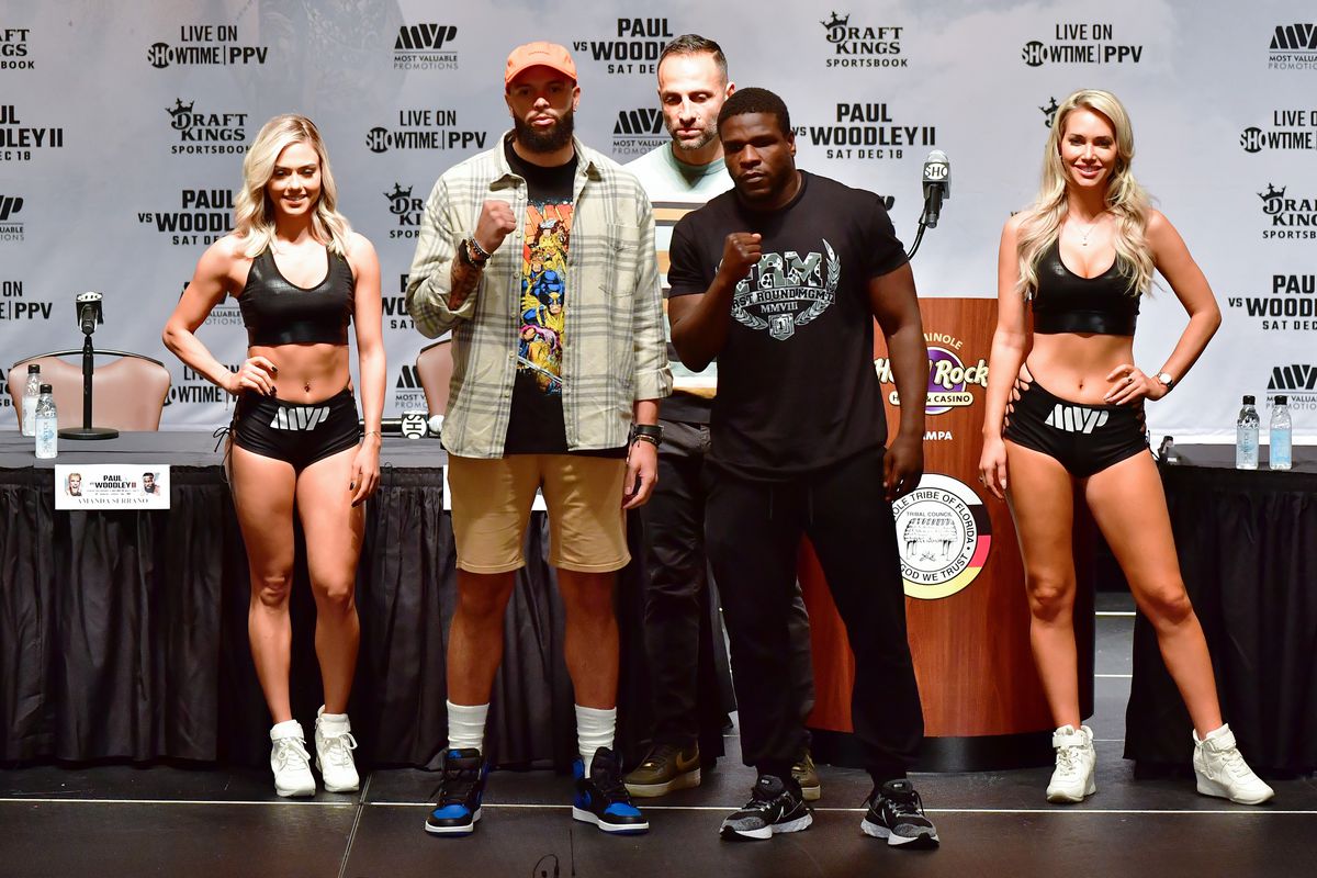 Frank Gore and Deron Williams size up during a press conference at the Seminole Hard Rock Tampa prior to a December 18th heavyweight fight on December 16, 2021 in Tampa, Florida.