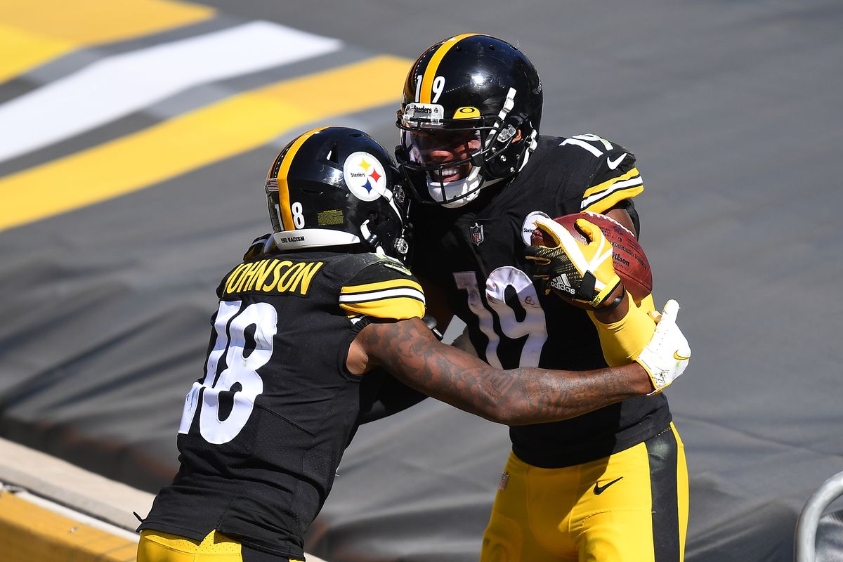 Diontae Johnson celebrates his touchdown with JuJu Smith-Schuster of the Pittsburgh Steelers during the fourth quarter against the Denver Broncos at Heinz Field on September 20, 2020 in Pittsburgh, Pennsylvania.