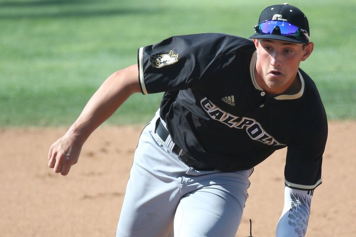 Cal Poly shortstop Brooks Lee charges a ground ball