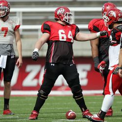 Utah Utes offensive linesman Vyncent Jones (64) calls a play during a team scrimmage in Salt Lake City Friday, April 5, 2013.