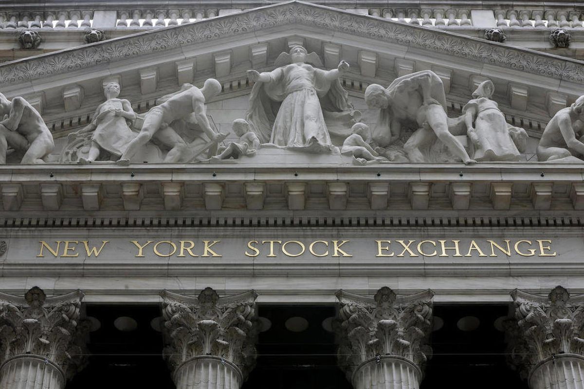 This Thursday, Oct. 2, 2014, file photo, shows the facade of the New York Stock Exchange. Stocks were mostly higher on Tuesday, Feb. 10, 2015, despite losses in Asia, as investors monitor a standoff between Greece and its creditors that threatens to shake