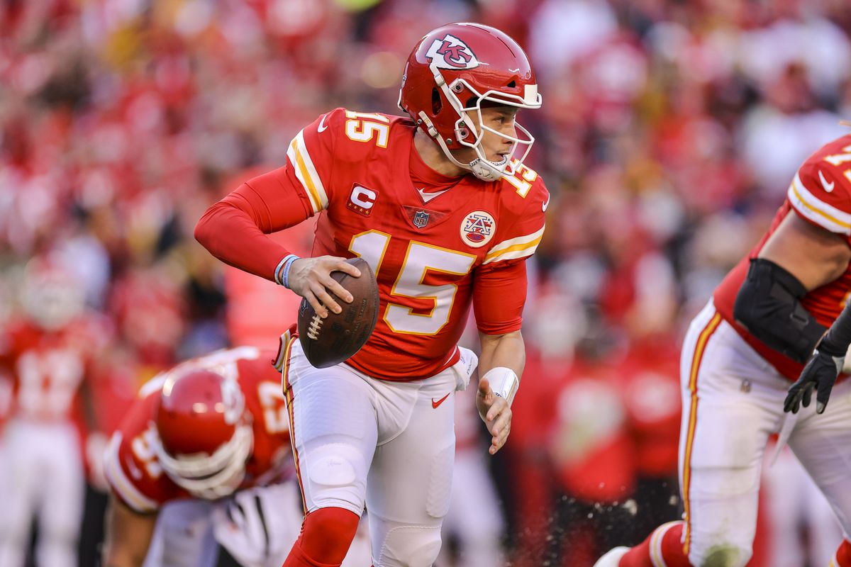 Patrick Mahomes #15 of the Kansas City Chiefs runs with the football during the first quarter of the AFC Championship Game against the Cincinnati Bengals at Arrowhead Stadium on January 30, 2022 in Kansas City, Missouri, United States.