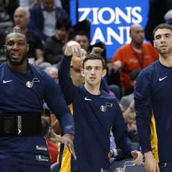 From left to right, Utah Jazz's Jae Crowder, David Stockton and Georges Niang reacts as they sit on the bench in the second half during an NBA basketball game against the Atlanta Hawks Tuesday, March 20, 2018, in Salt Lake City. (AP Photo/Rick Bowmer)