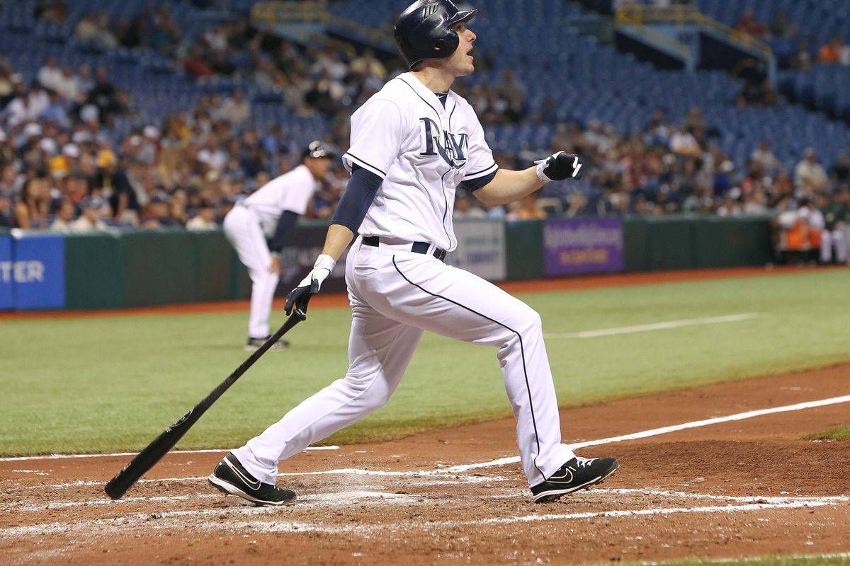 August 23, 2012; St. Petersburg, FL, USA; Tampa Bay Rays right fielder Matt Joyce (20) hits a 2-RBI double in the fifth inning against the Oakland Athletics at Tropicana Field. Mandatory Credit: Kim Klement-US PRESSWIRE