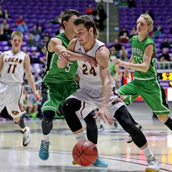 Logan's Tyler Brimhall drives on Provo's Chase Piggott as Logan High School defeats Provo High School in the 4A Utah State Basketball boys tournament at Weber State University on Tuesday, Feb. 24, 2015, in Ogden.  
