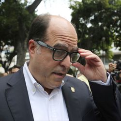 President of Venezuelan National Assembly Julio Borges speaks with members of the media during a news conference in Caracas, Venezuela, Saturday, Aug. 5, 2017. The head of Venezuela's opposition-controlled congress made an emotional plea for opponents of President Maduro to remain mobilized on the streets to capitalize growing international pressure on the embattled socialist.