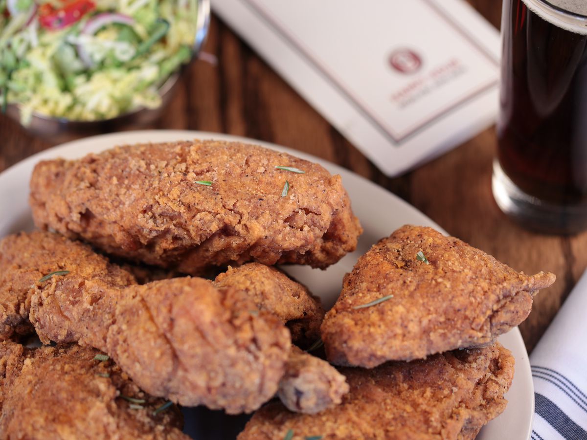 Fried chicken with salad and beer
