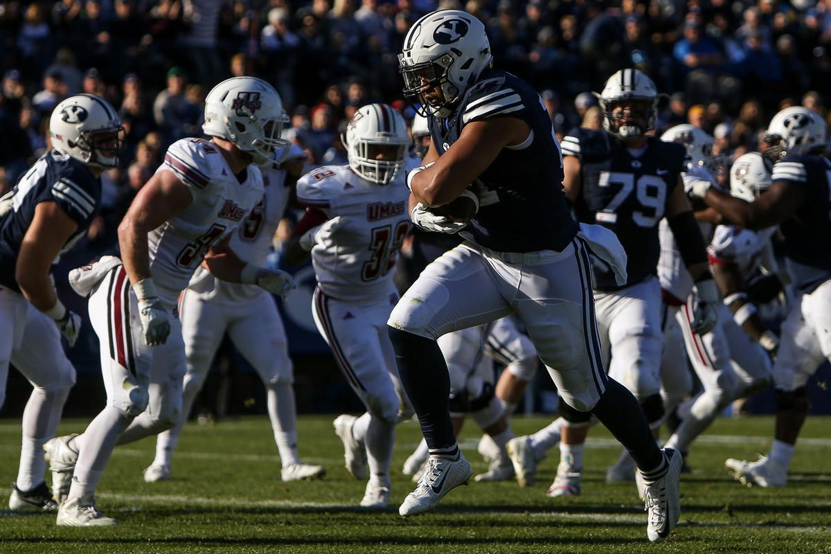 BYU linebacker Harvey Langi runs for a touchdown during game agasint the UMass Minutemen at LaVell Edwards Stadium in Provo on Saturday, Nov. 19, 2016. The Cougars, with their front-loaded schedule, will need to keep their guard up in the latter half of t