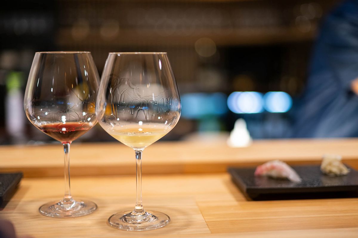 Two wine glasses at Sushi Note Omakase.