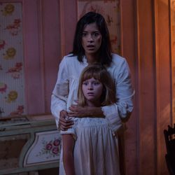 Lulu Wilson, front, as Linda and Stephanie Sigman as Sister Charlotte in "Annabelle: Creation."