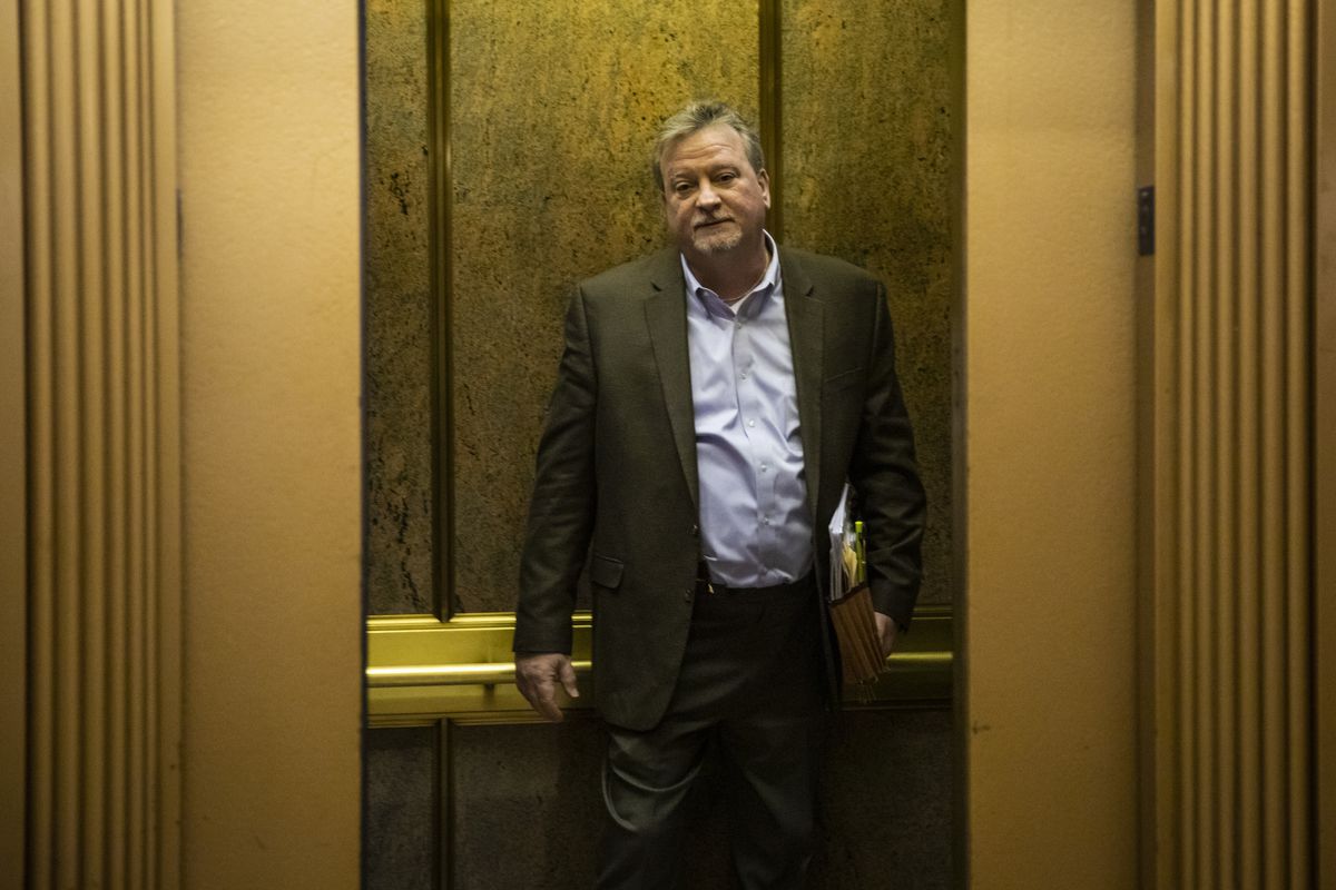 Jeffrey Tobolski, who formerly was a Cook County Board member and mayor of McCook, waits in an elevator in 2019.